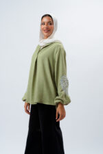 Linen blouse with a seven-neckline and embroidery on the sleeves - Image 2