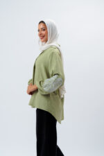 Linen blouse with a seven-neckline and embroidery on the sleeves - Image 5