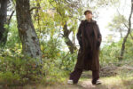 Wool coat with 2 pockets, fur trim, and belt. - Image 5