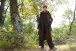 Wool coat with 2 pockets, fur trim, and belt. - Image 6