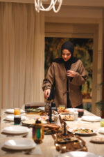 blouse with a four-drawstring necklin - Image 2